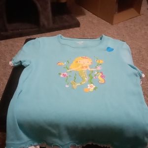 Child's shirt machine wash.  Light blue.  Mermaid on front beaded. Healthtex S8
